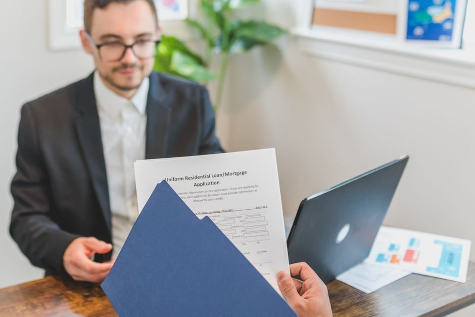 Nurse reviewing student loan documents